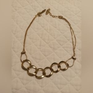 Yellow silver or gold plated necklace. Not marked but tarnishes.
